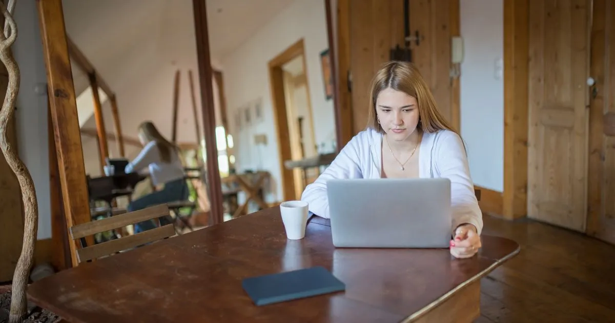 Canadian borrower learning how to get a quick loan on her laptop